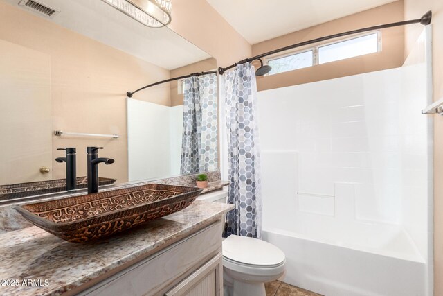 1631 E Carla Vista Dr, Chandler, AZ 85225 - bathroom with shower / bathtub combination with curtain, vanity, visible vents, and toilet