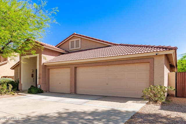 1631 E Carla Vista Dr, Chandler, AZ 85225 - view of front of home with a garage, stucco siding, and concrete driveway