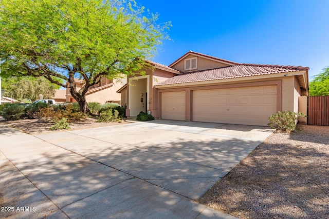 1631 E Carla Vista Dr, Chandler, AZ 85225 - view of front of house with a tiled roof, stucco siding, fence, an attached garage, and driveway