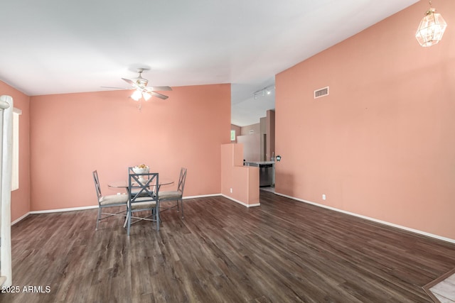 1631 E Carla Vista Dr, Chandler, AZ 85225 - unfurnished dining area featuring visible vents, baseboards, vaulted ceiling, and wood finished floors