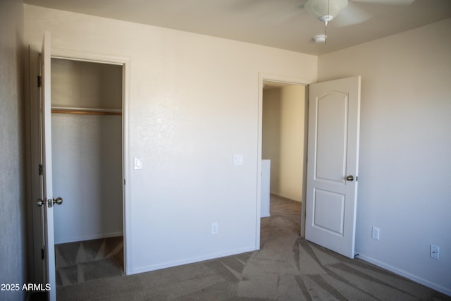 unfurnished bedroom with a closet and carpet