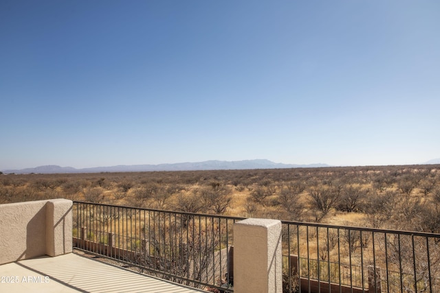 balcony featuring a mountain view