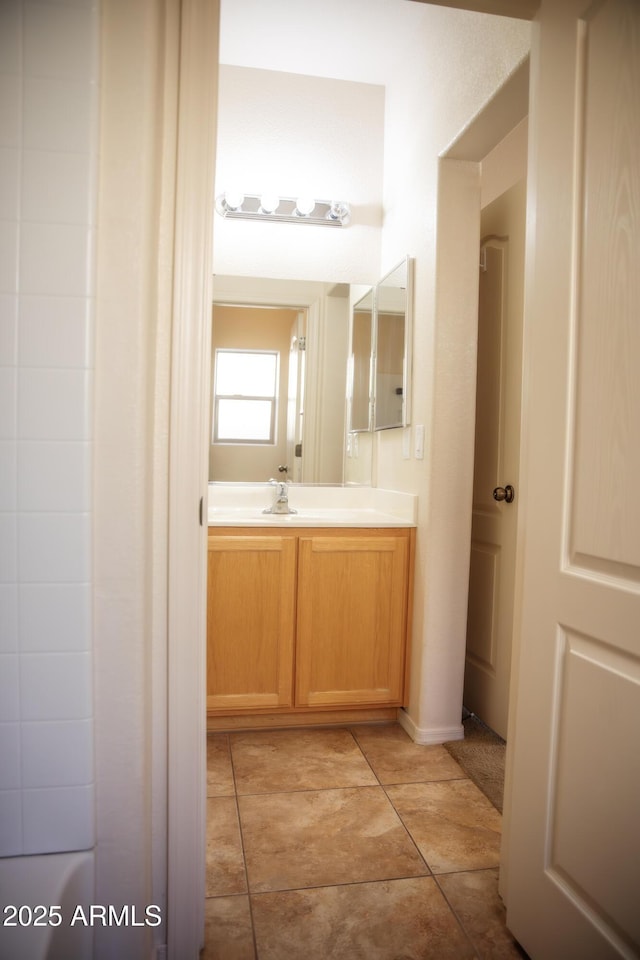 bathroom featuring vanity and tile patterned flooring