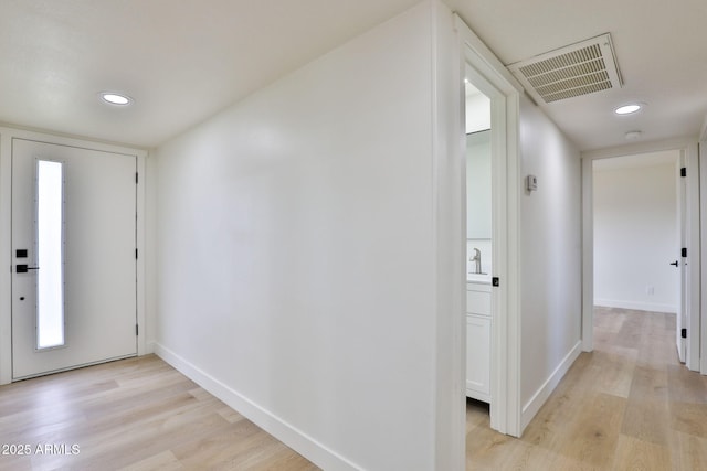 entrance foyer featuring light wood-type flooring