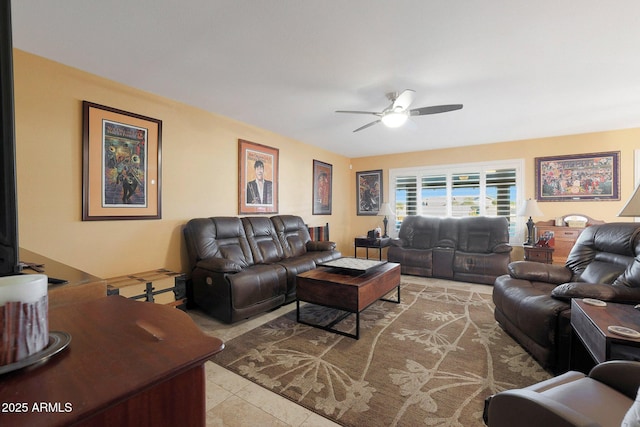 tiled living room with ceiling fan