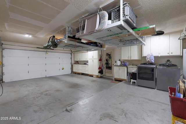 garage featuring independent washer and dryer