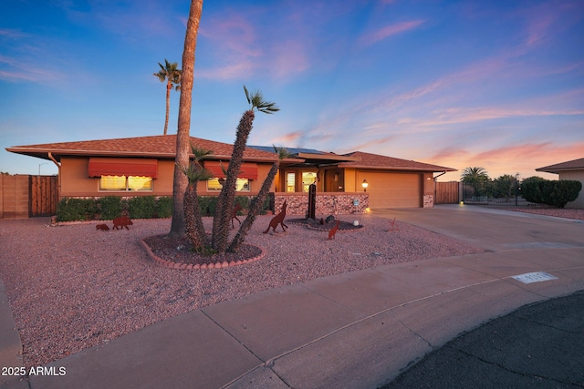 view of front of home with a garage