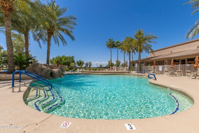 view of pool featuring a patio area