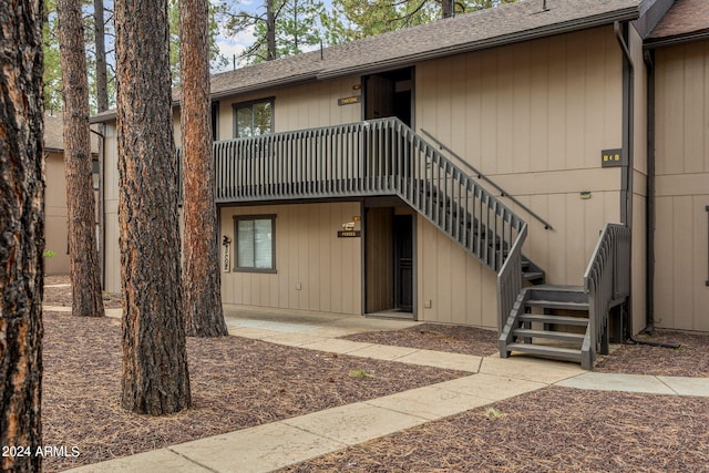 doorway to property with a patio