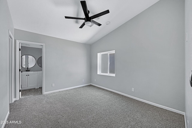1804 E Pueblo Ave, Phoenix, AZ 85040 - unfurnished bedroom featuring carpet, vaulted ceiling, baseboards, connected bathroom, and ceiling fan