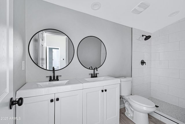 1804 E Pueblo Ave, Phoenix, AZ 85040 - full bath featuring toilet, a baseboard heating unit, double vanity, and a tile shower