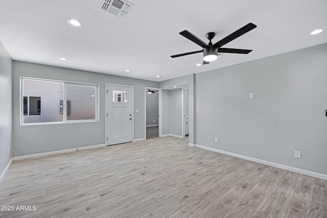 1804 E Pueblo Ave, Phoenix, AZ 85040 - unfurnished living room featuring a ceiling fan, baseboards, light wood-style flooring, and recessed lighting