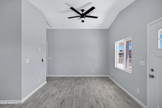 1804 E Pueblo Ave, Phoenix, AZ 85040 - spare room featuring lofted ceiling, a ceiling fan, light wood-style floors, and baseboards