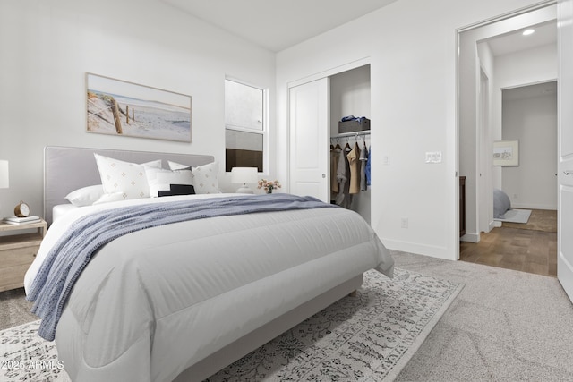 bedroom featuring hardwood / wood-style floors and a closet