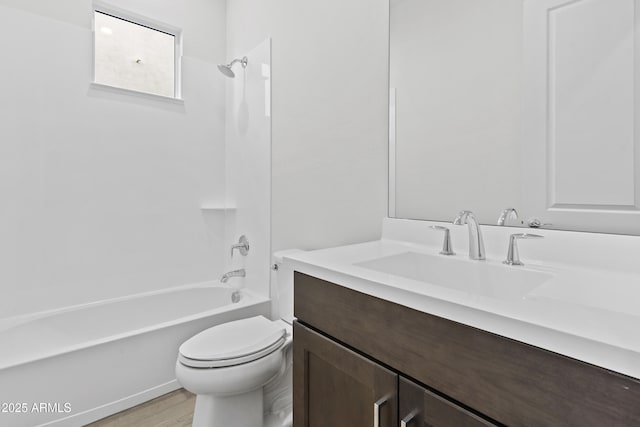 full bathroom with vanity, toilet, shower / bath combination, and hardwood / wood-style floors