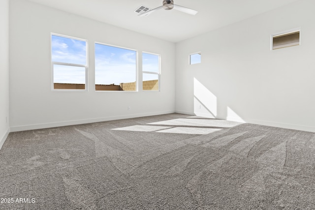 unfurnished room featuring carpet flooring and ceiling fan