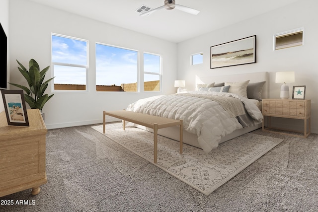 bedroom featuring ceiling fan and carpet