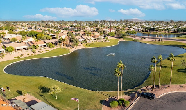 aerial perspective of suburban area with a nearby body of water