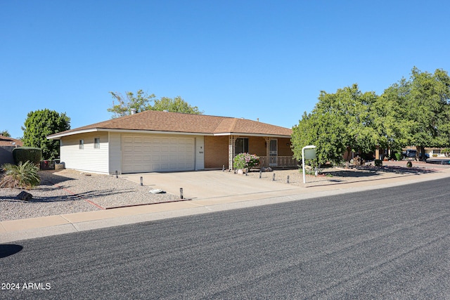 single story home featuring a garage