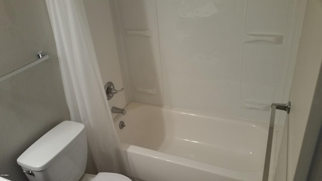 full bath with toilet and shower / tub combo