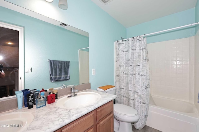 full bathroom with visible vents, double vanity, a sink, shower / tub combo, and toilet