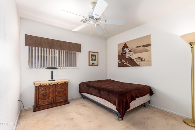 bedroom with carpet and a ceiling fan