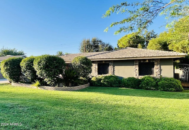 view of property exterior featuring a yard