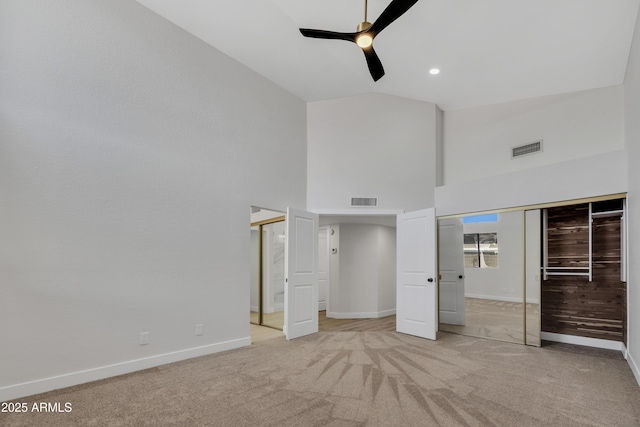 3926 E Coconino St, Phoenix, AZ 85044 - unfurnished bedroom with carpet, high vaulted ceiling, and ceiling fan
