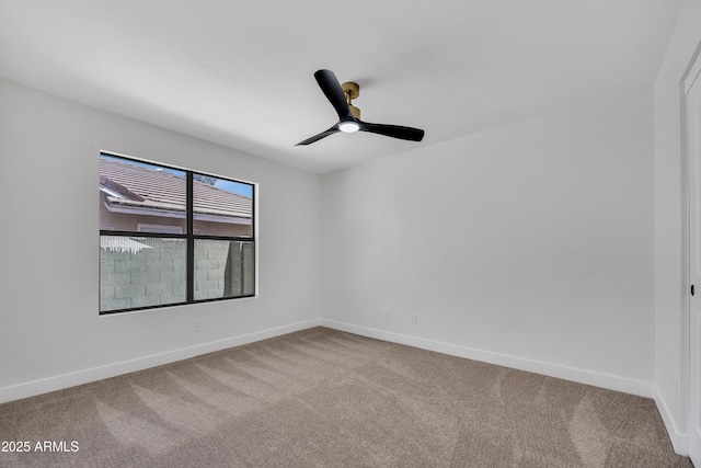 3926 E Coconino St, Phoenix, AZ 85044 - carpeted spare room featuring baseboards and a ceiling fan