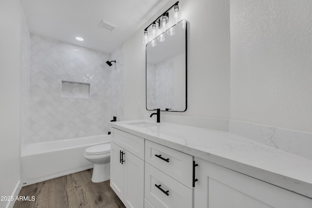 3926 E Coconino St, Phoenix, AZ 85044 - full bathroom featuring vanity, wood finished floors, and washtub / shower combination