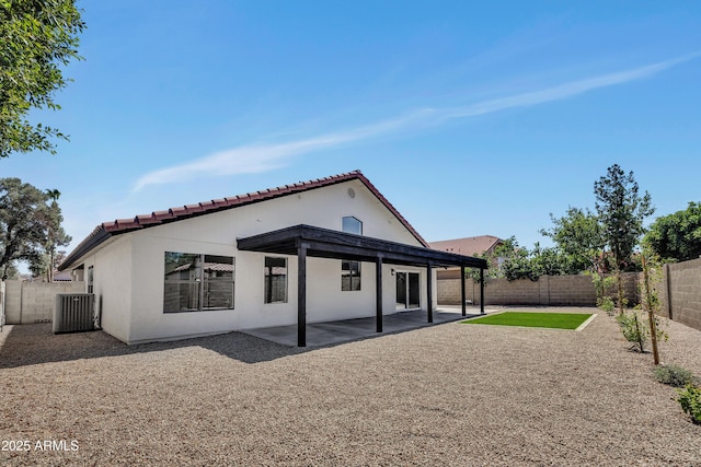 3926 E Coconino St, Phoenix, AZ 85044 - rear view of house with a tiled roof, a fenced backyard, a patio area, and stucco siding