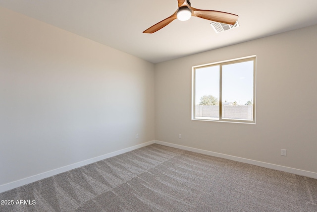 empty room with a ceiling fan, light carpet, visible vents, and baseboards