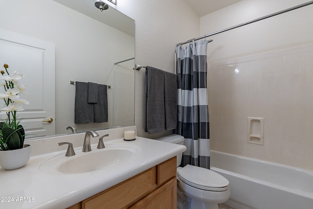 full bathroom with vanity, toilet, and shower / tub combo with curtain