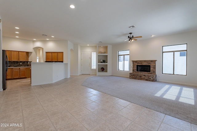 2223 E Branham Ln, Phoenix, AZ 85042 - unfurnished living room with light tile patterned floors, ceiling fan, baseboards, visible vents, and recessed lighting