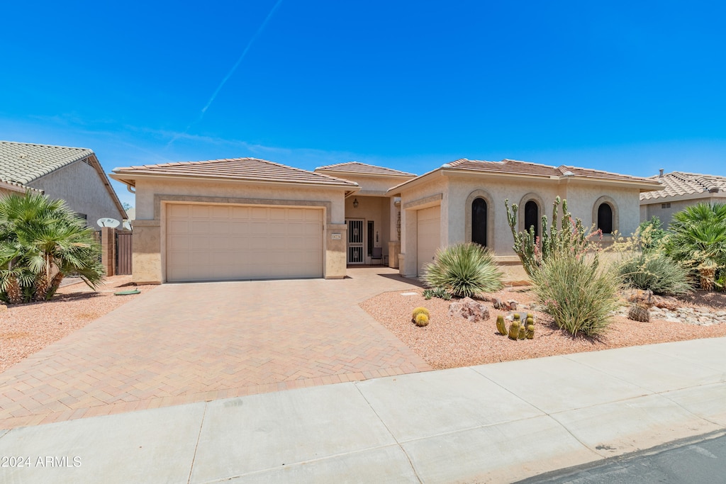 view of front of property featuring a garage