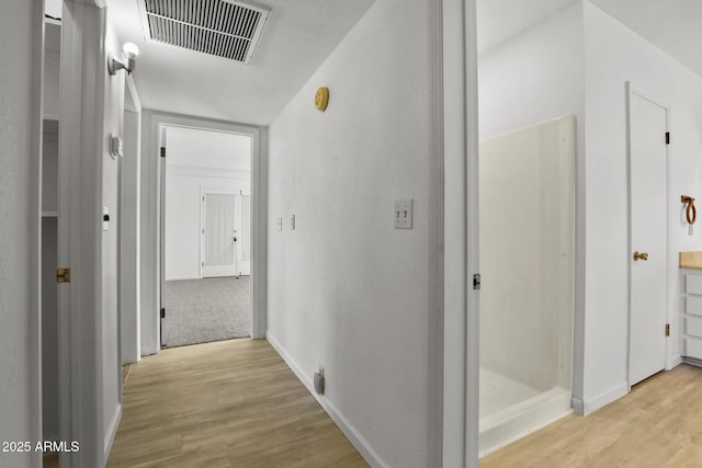 hall featuring light hardwood / wood-style flooring