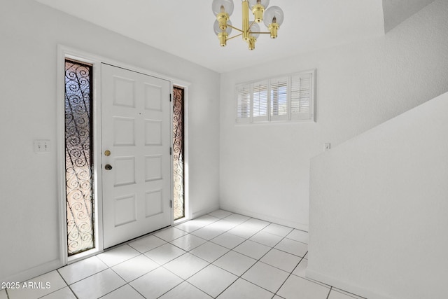 foyer with light tile patterned flooring and a notable chandelier