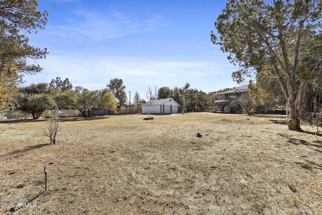 view of yard featuring a garage