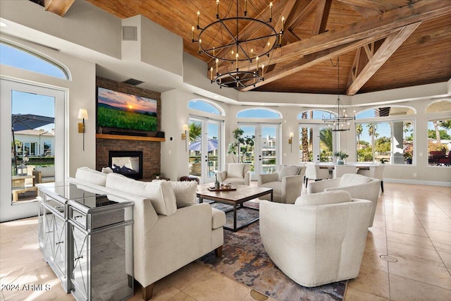 living room with french doors, high vaulted ceiling, wooden ceiling, and a fireplace