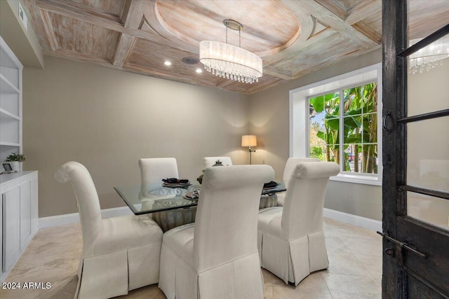 tiled dining area with coffered ceiling, wood ceiling, beamed ceiling, ornamental molding, and a chandelier