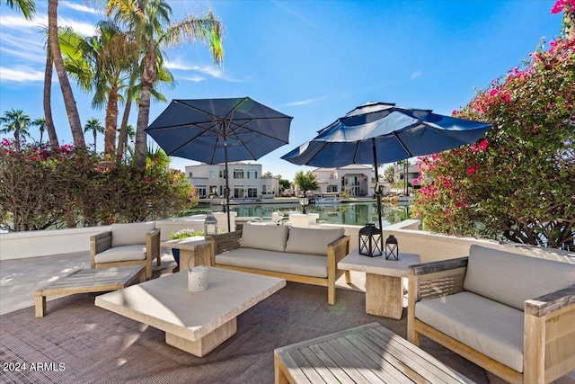 wooden terrace featuring a patio and an outdoor living space