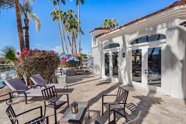 view of patio / terrace featuring french doors