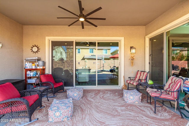 view of patio with ceiling fan