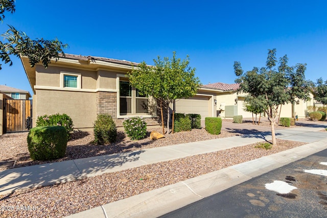 view of front of property with a garage