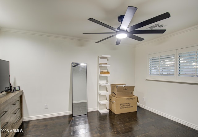 bedroom with ceiling fan, crown molding, and dark wood-type flooring