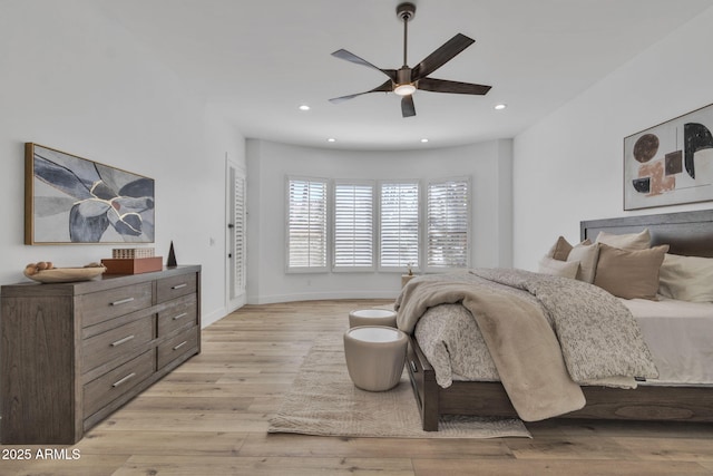 bedroom featuring light wood-type flooring, baseboards, a ceiling fan, and recessed lighting