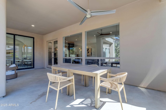 view of patio featuring outdoor dining area