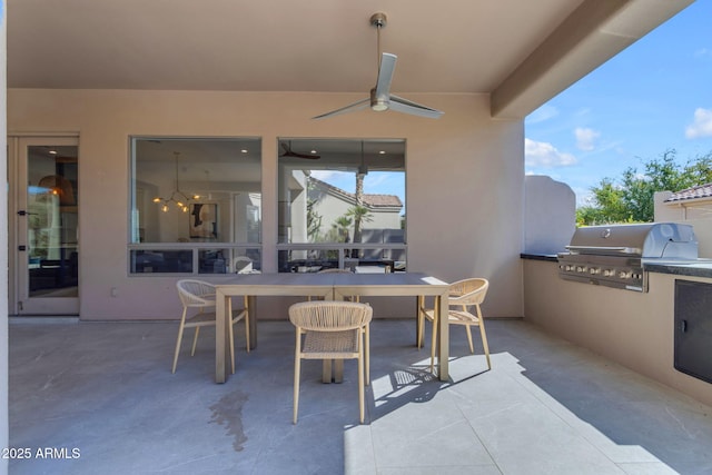 view of patio / terrace featuring outdoor dining space, a grill, area for grilling, and ceiling fan