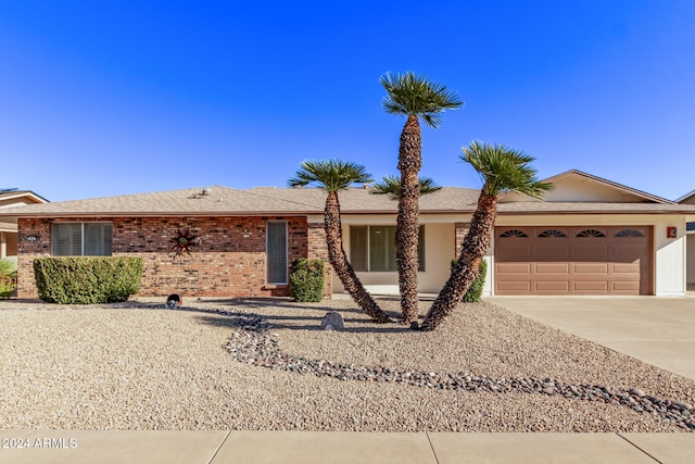 ranch-style house with a garage