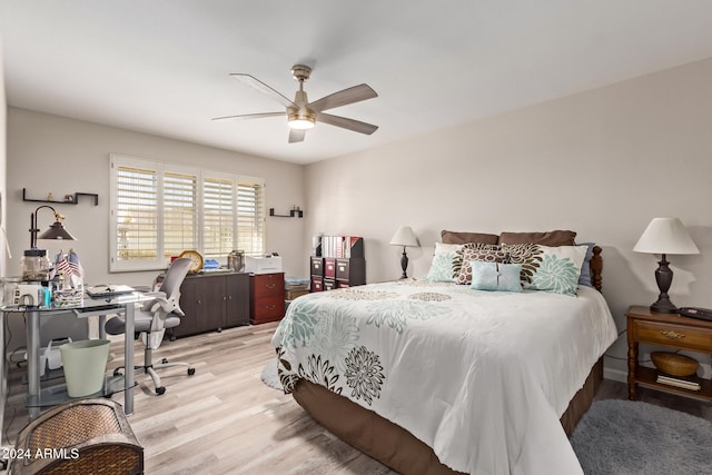 bedroom featuring ceiling fan and light wood-type flooring